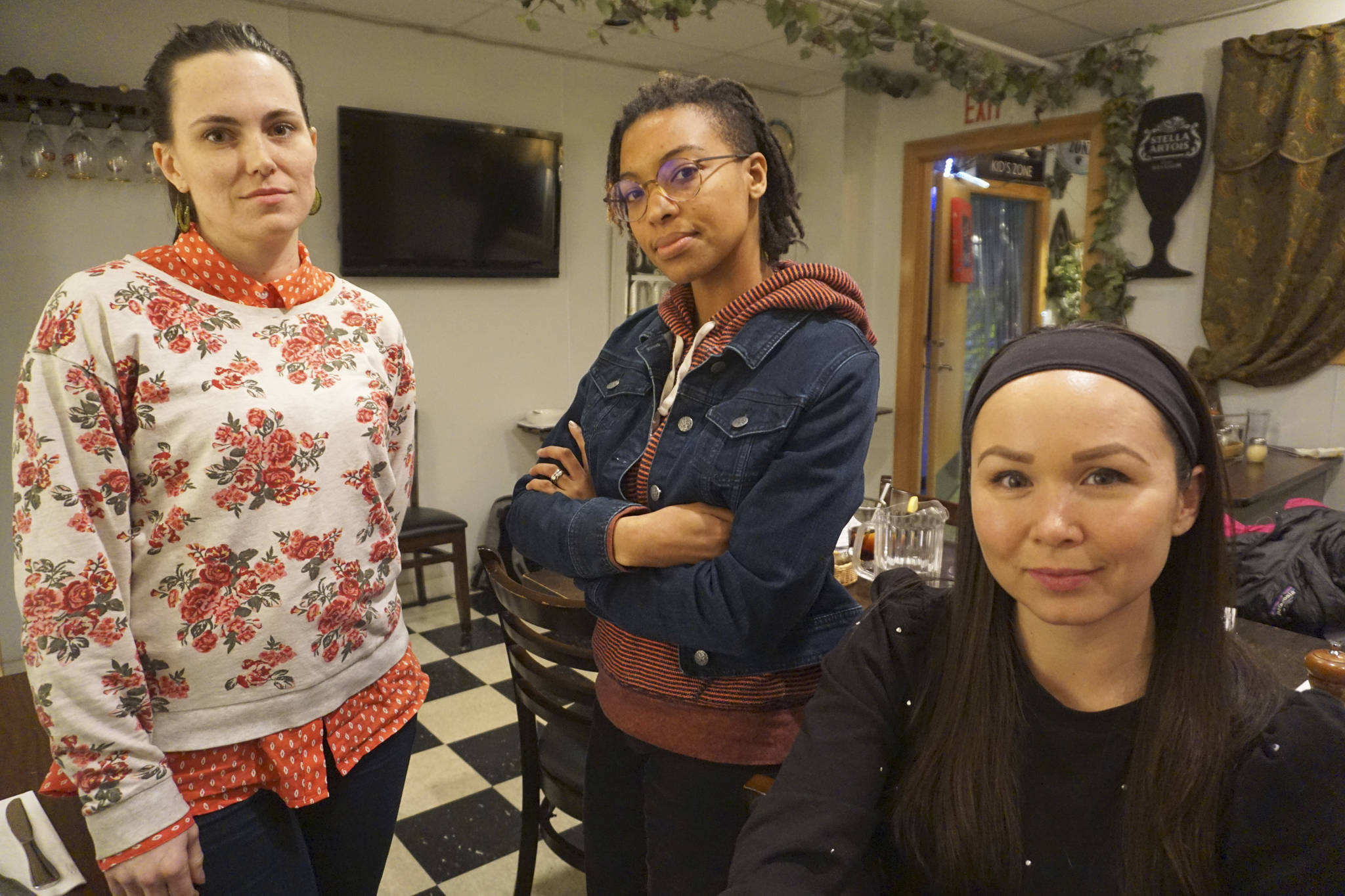 Andrea Bernard, Allycea Weil, and Phoenix Johnson (left to right) are Licton Springs K-8 parents who want their kids to stay in the Native-centered program. Photo by Melissa Hellmann