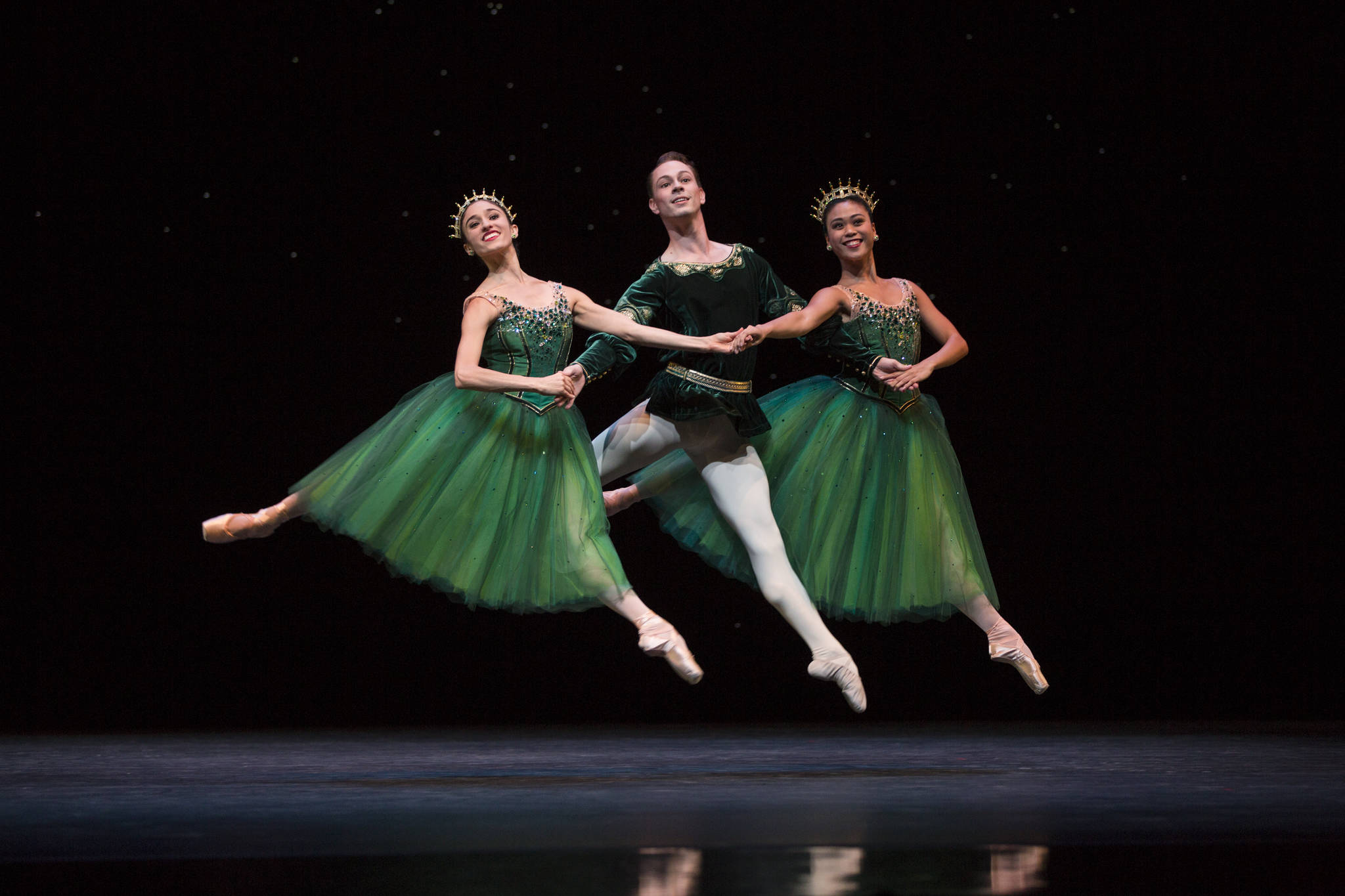 Pacific Northwest Ballet soloists Leta Biasucci, Kyle Davis, and Angelica Generosa in Emeralds from Jewels, choreography by George Balanchine. Photo by Angela Sterling