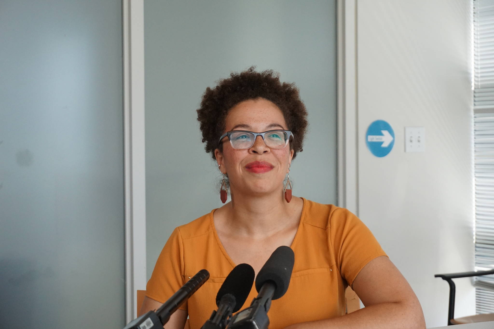 Kirsten Harris-Talley speaks to reporters after being sworn in as Seattle City Councilmember for position 8. Photo by Casey Jaywork