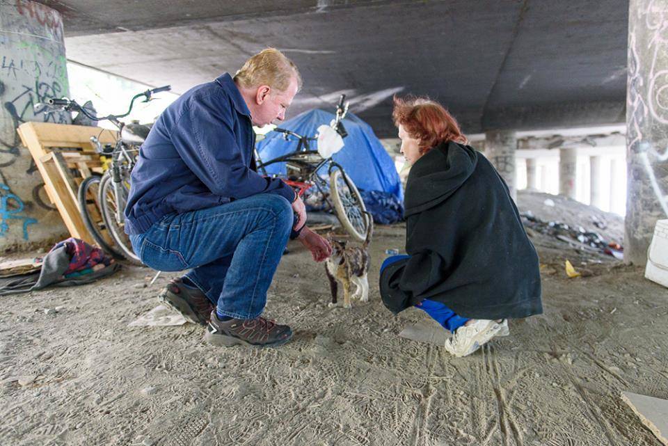 Before evicting the Jungle last year, Mayor Murray petted a kitten inside it. Photo via mayor’s office.