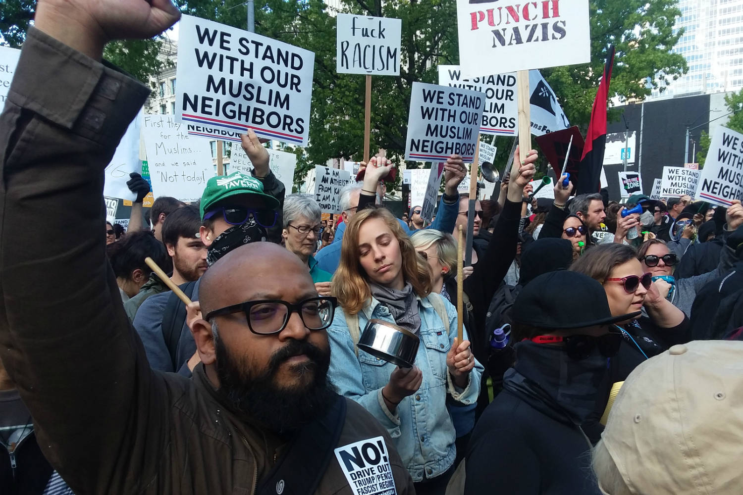 Seattleites counter-protest outside City Hall against an ‘anti-sharia,’ pro-Trump rally. Photo by Casey Jaywork